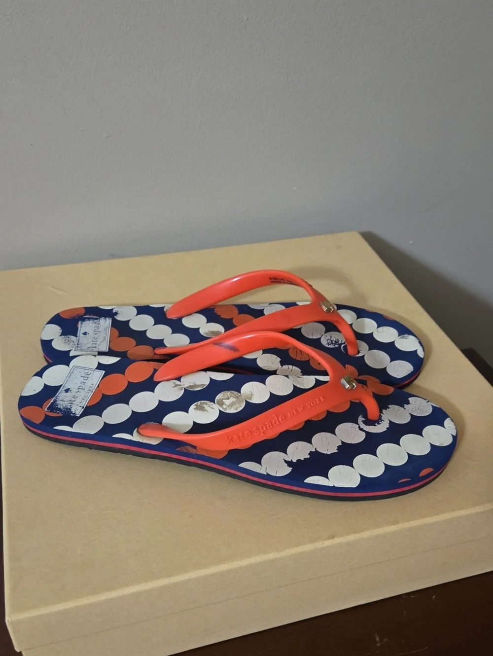 kate spade navy flip flops with white and coral polka dots Size 10M